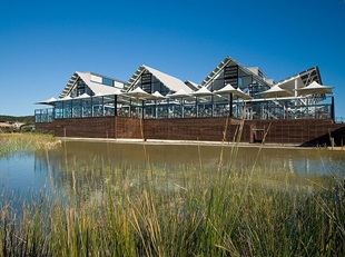 Caves Beachside at Lake Macquarie uses COLORBOND® Ultra steel in the colour Shale Grey™ to top each pavillion.
